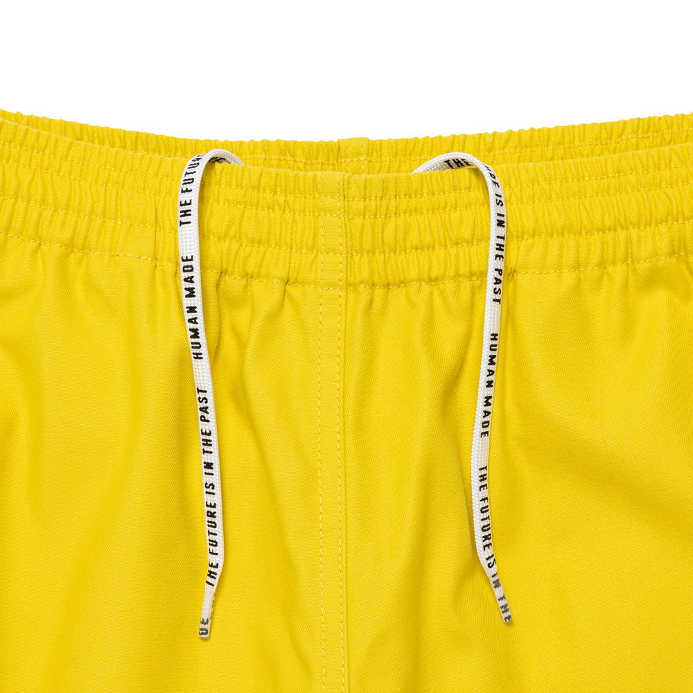 HUMAN MADE BEACH SHORTS YE-C